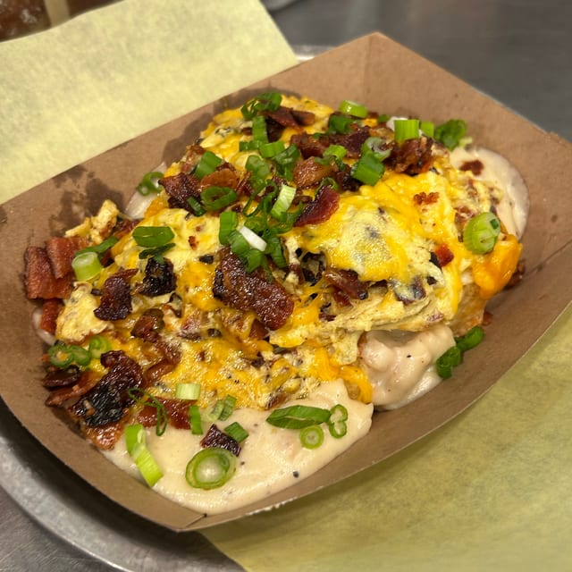 Bacon, Cheddar & Chive Scramble Biscuits And Gravy.
